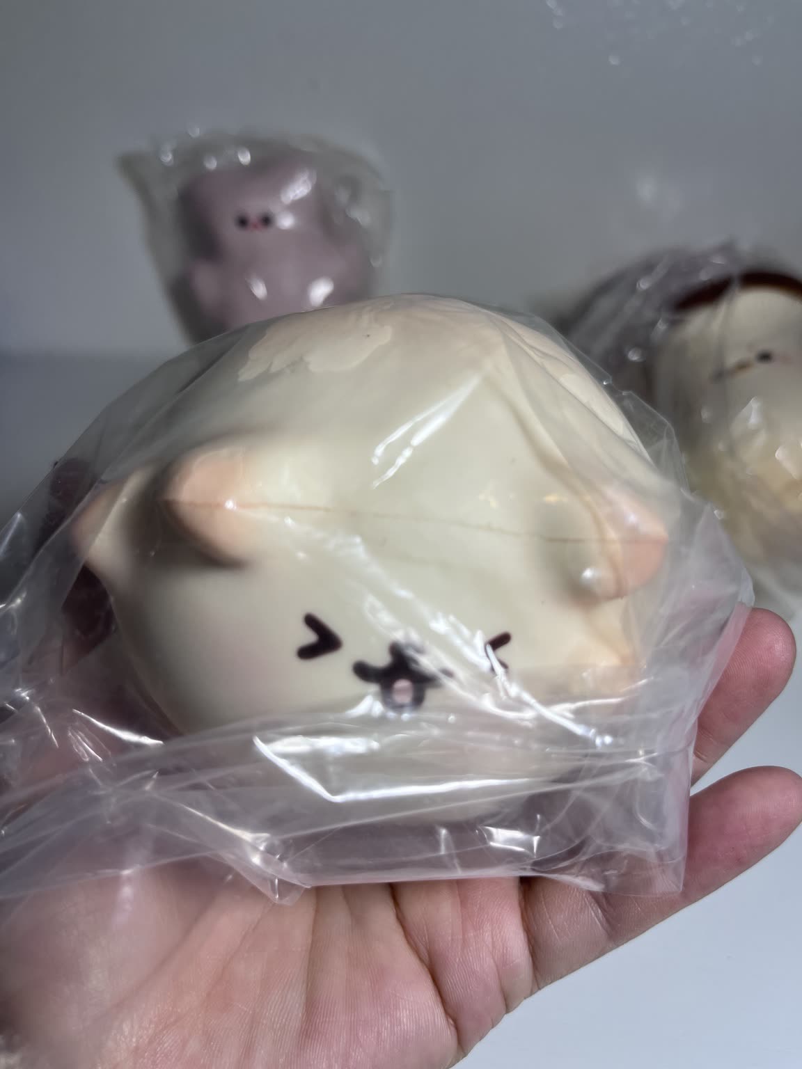 Yellow bunny slow-rising squishy with a scarf